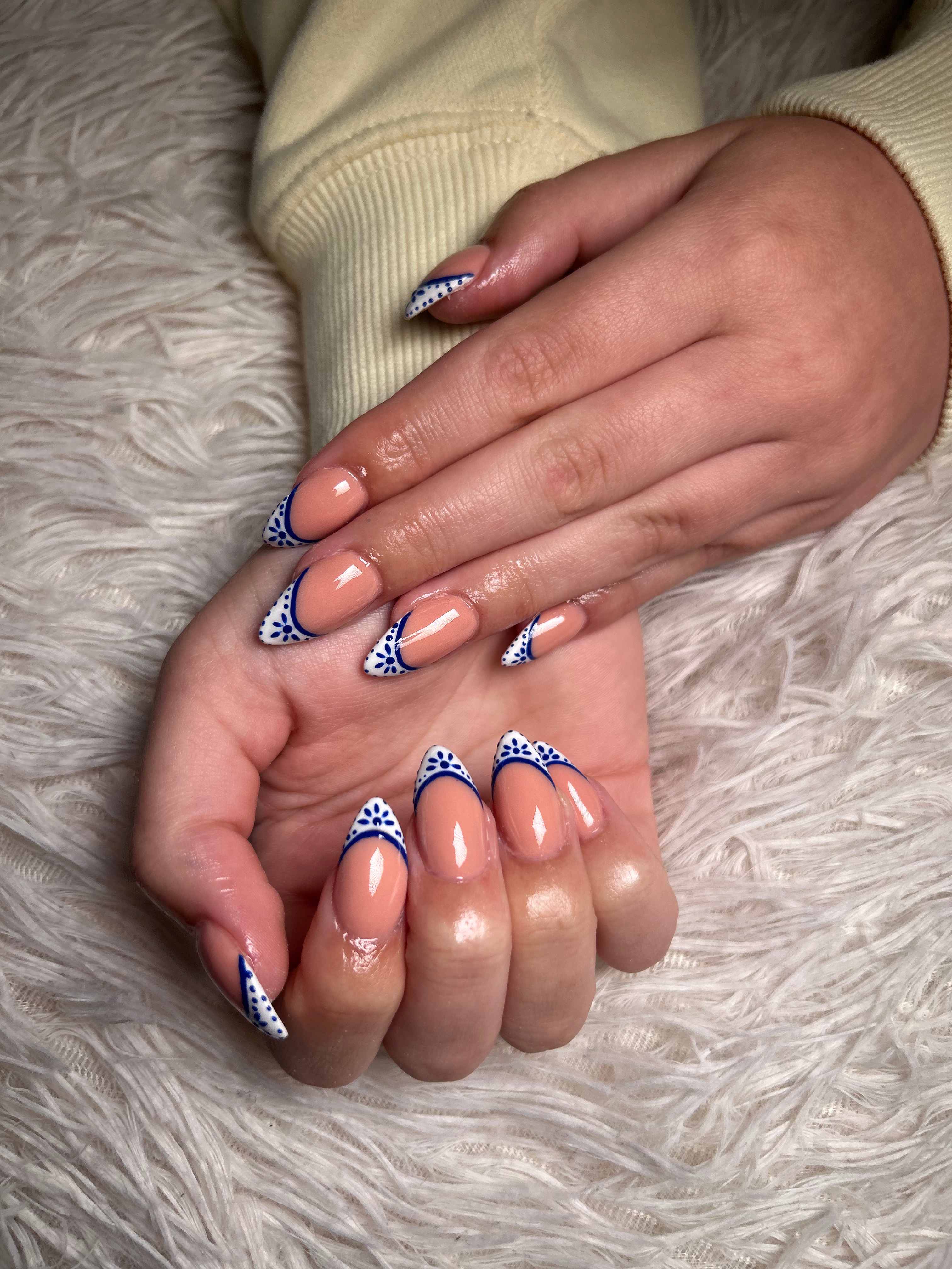 Soft pink and white French nail set by Nails by Mo Gems